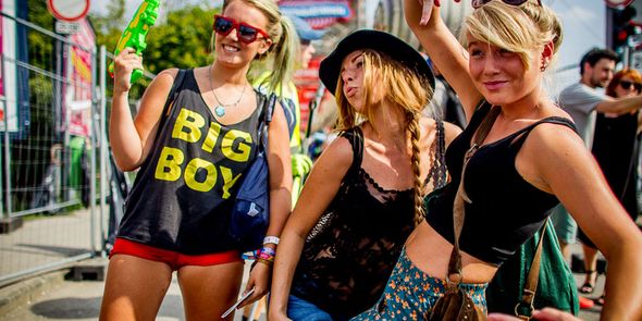 three girls at a summer music festival